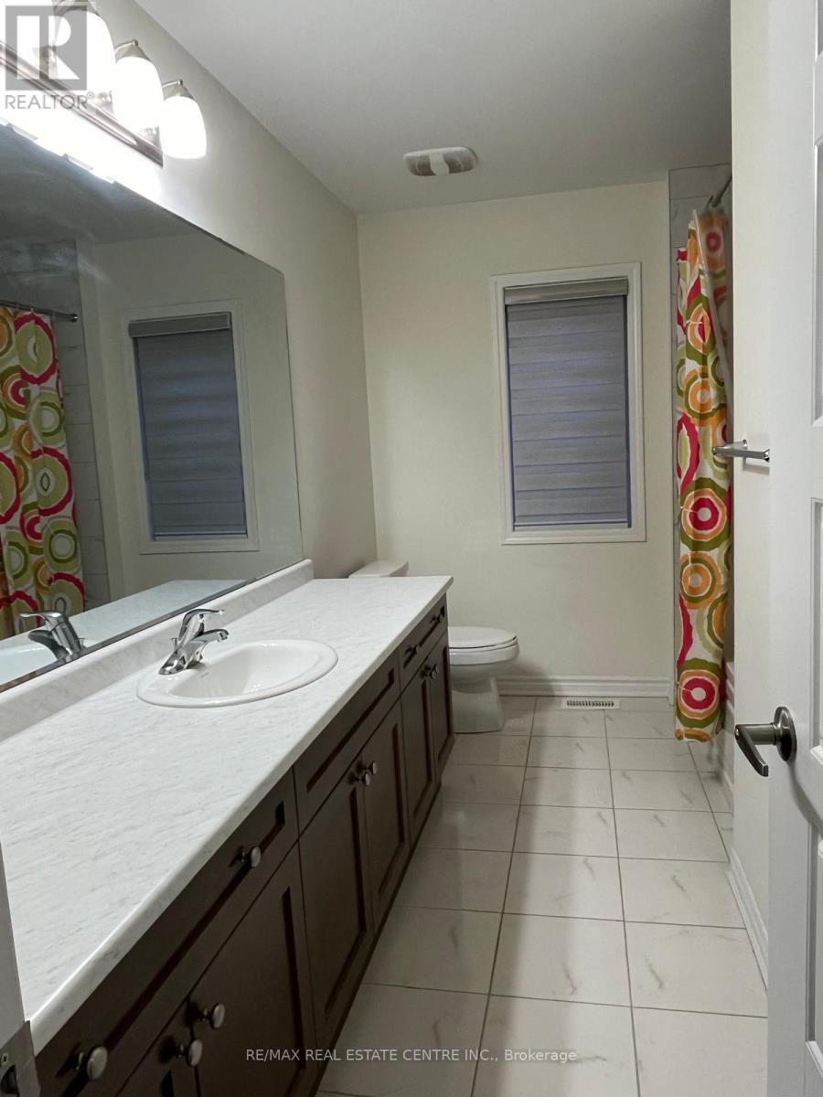 869 Magnolia Terrace, Milton, Ontario  L9E 1R2 - Photo 7 - W12706734