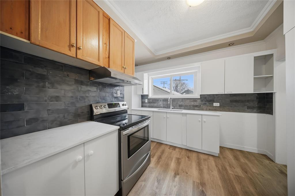 1663 Pacific Avenue W, Winnipeg, Manitoba  R3E 1H6 - Photo 4 - 202601013