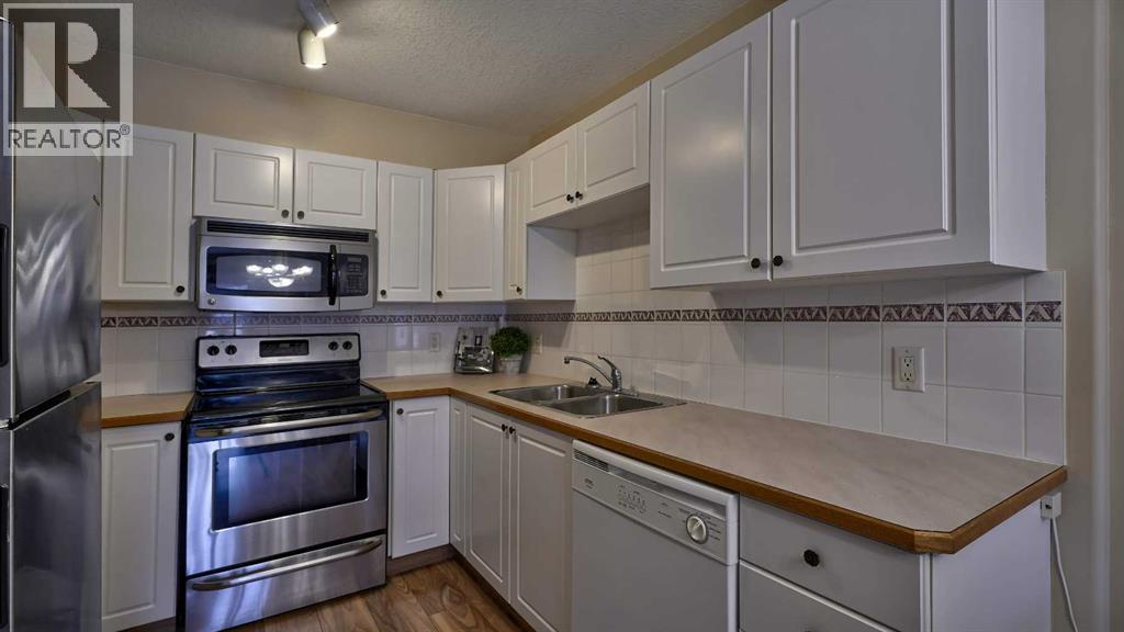 211, 728 Country Hills Road Nw, Calgary, Alberta  T3K 5K8 - Photo 8 - A2273653