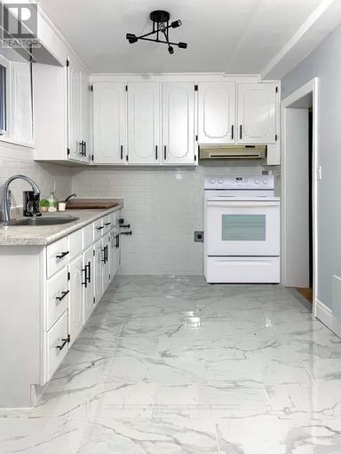 Lower Level - 9a Winfield Avenue, Toronto, Ontario  M6S 2J7 - Photo 13 - W12706960