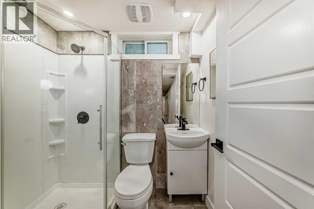 946 Berkley Drive Nw, Calgary, Alberta  T3K 1A2 - Photo 41 - A2264876