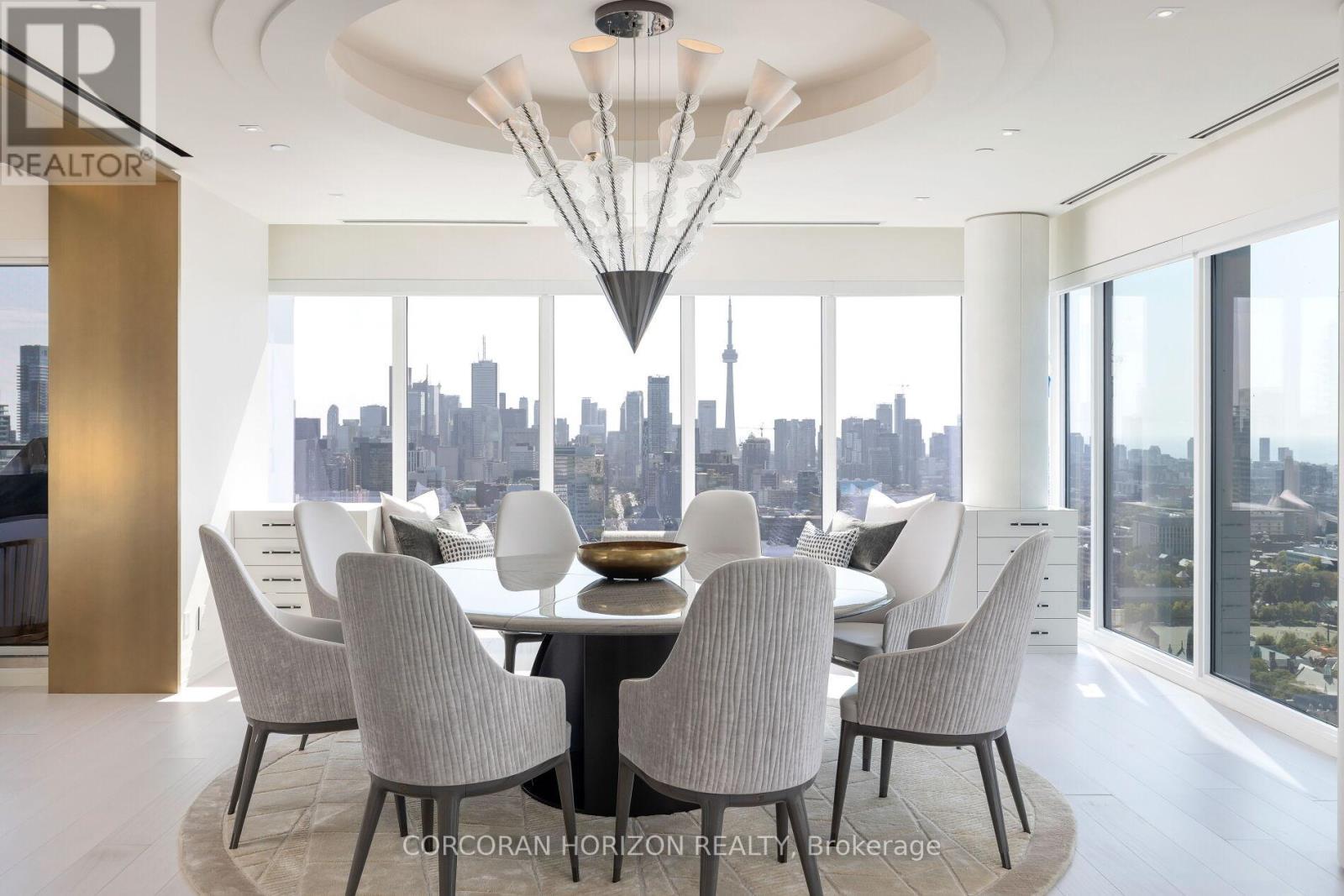 Nestled in the heart of Yorkville, Canada's premier luxury neighbourhood, this extraordinary 4,012 sq. ft. Executive Suite at Yorkville Private Estates delivers a living experience like no other. Never offered before, this residence showcases the highest level of craftsmanship and materials sourced globally. Every detail has been thoughtfully curated to appeal to the most discerning buyer. Elevated high above, revel in the stunning views of the Toronto skyline, captivating both day and night. For car enthusiasts, the property features a rare, enclosed garage with 6 parking spaces, including one with an EV charger, along with 3 private lockers for additional storage. Highlights include: ***Exquisite Interiors: Custom Cabinetry and Millwork crafted by Mar- Tec Woodworking. ***Bespoke Detailing: Wrapped leather columns, handpicked California hardware by ADH Fine Hardware, and custom-designed cabinetry set this home apart. ***Artisanal Finishes: Custom Murano & Baccarat light fixtures, Costa Marble installations, and 7" custom Sapele wood flooring by Rosewood Flooring elevate every space. ***Masterful Design: Designed by Tomas Pearce, the residence includes a 12-foot custom fireplace by The Fireplace Specialists and an artfully crafted backsplash by world- renowned artist Rob Baylor. ***Five-Star Amenities: Enjoy 24-hour concierge, valet, two gyms, an indoor pool, golf simulator, party room, and an expansive rooftop terrace. This Executive Suite perfectly blends elegance and functionality, delivering the ultimate balance of luxury, privacy, and sophistication in one of Canada's most exclusive neighbourhoods. Yorkville is renowned for its fine dining, high-end shopping, and cosmopolitan allure. This lifestyle offers seamless access to Toronto's vibrant cultural and social scene. A true crown jewel in the sky. (id:48254)