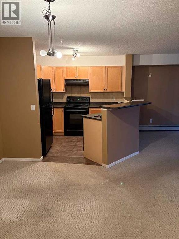 2112, 2518 Fish Creek Boulevard Sw, Calgary, Alberta  T2Y 4T6 - Photo 4 - A2276024