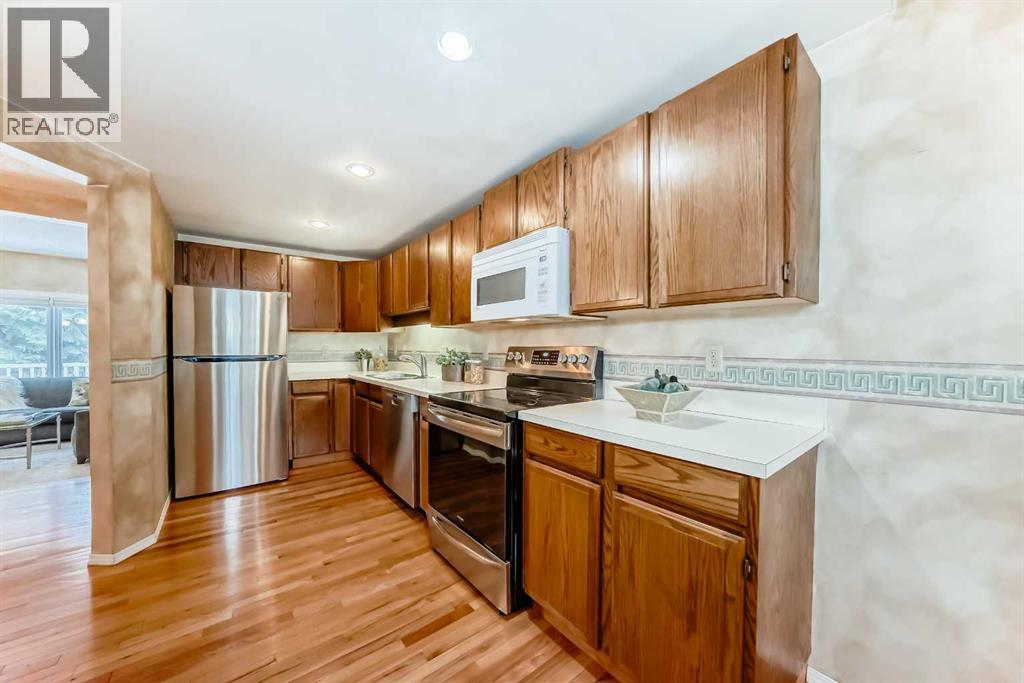 219 Point Mckay Terrace Nw, Calgary, Alberta  T3B 5B6 - Photo 5 - A2274805