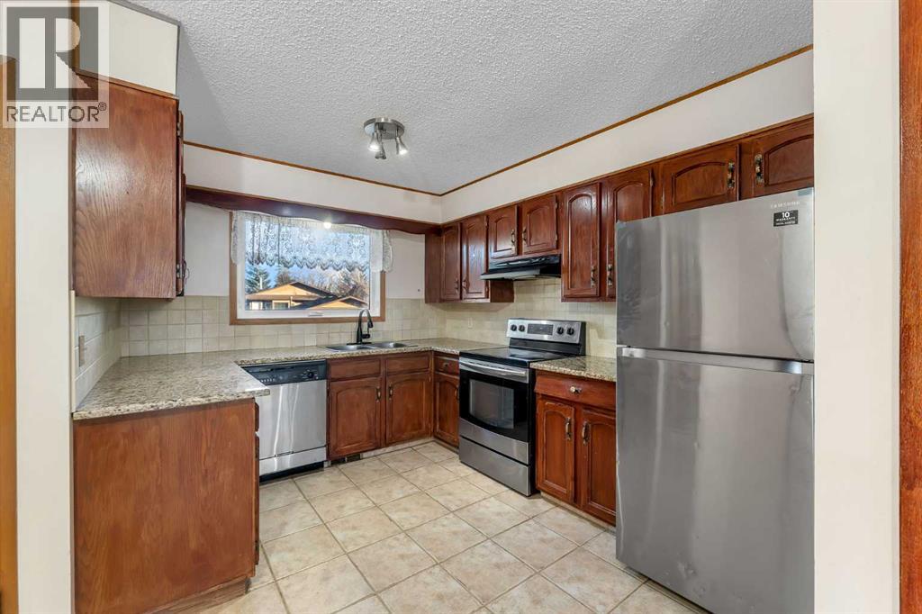 20 Templehill Crescent, Calgary, Alberta  T1Y 4C5 - Photo 6 - A2280127