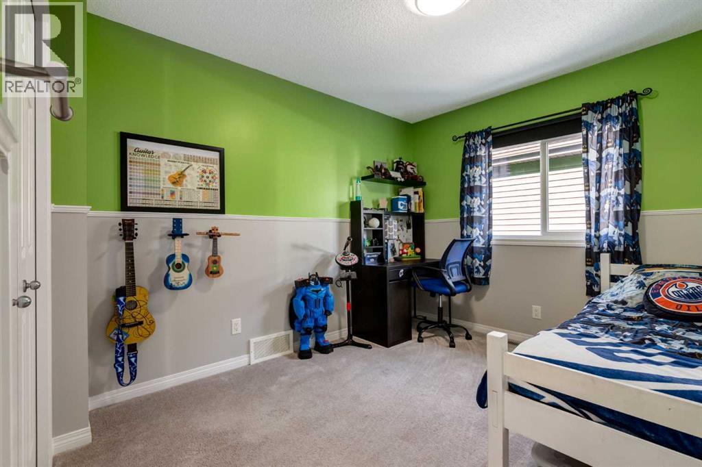 36 Sundown Common, Cochrane, Alberta  T4C 2M9 - Photo 27 - A2278817