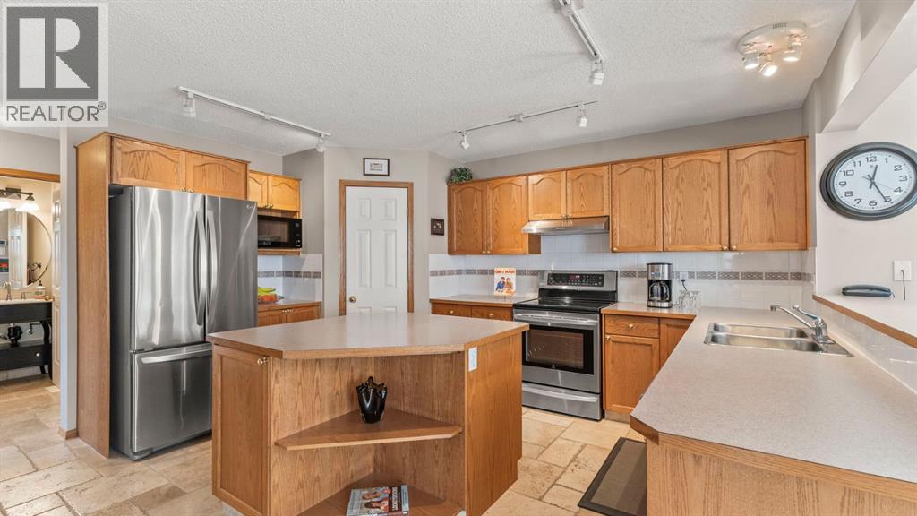 227 Rocky Ridge Close Nw, Calgary, Alberta  T3G 4X2 - Photo 9 - A2278094