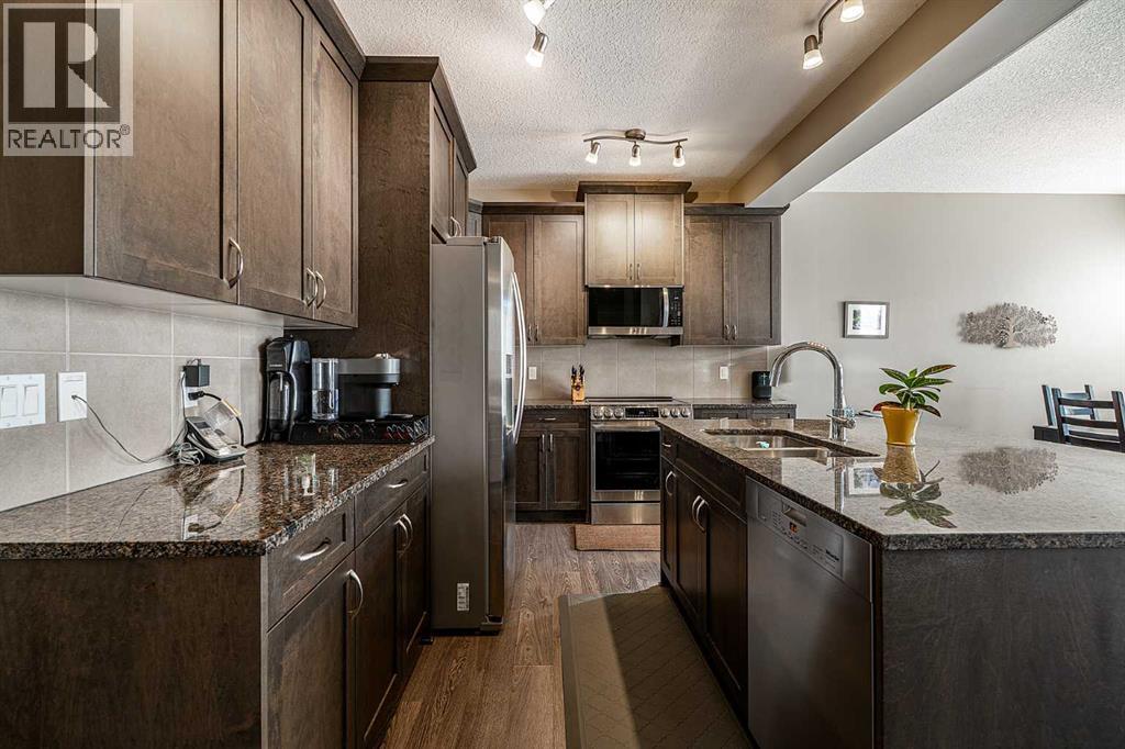 1156 Hillcrest Lane Sw, Airdrie, Alberta  T4B 3W2 - Photo 8 - A2280056