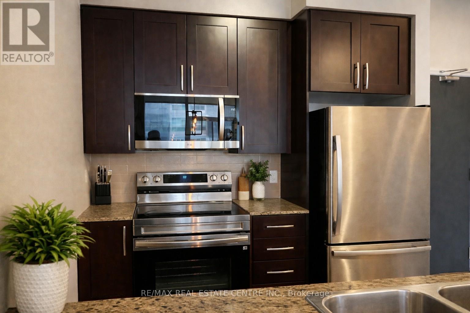 307 - 4070 Confederation Parkway, Mississauga, Ontario  L5B 0E9 - Photo 2 - W12647202