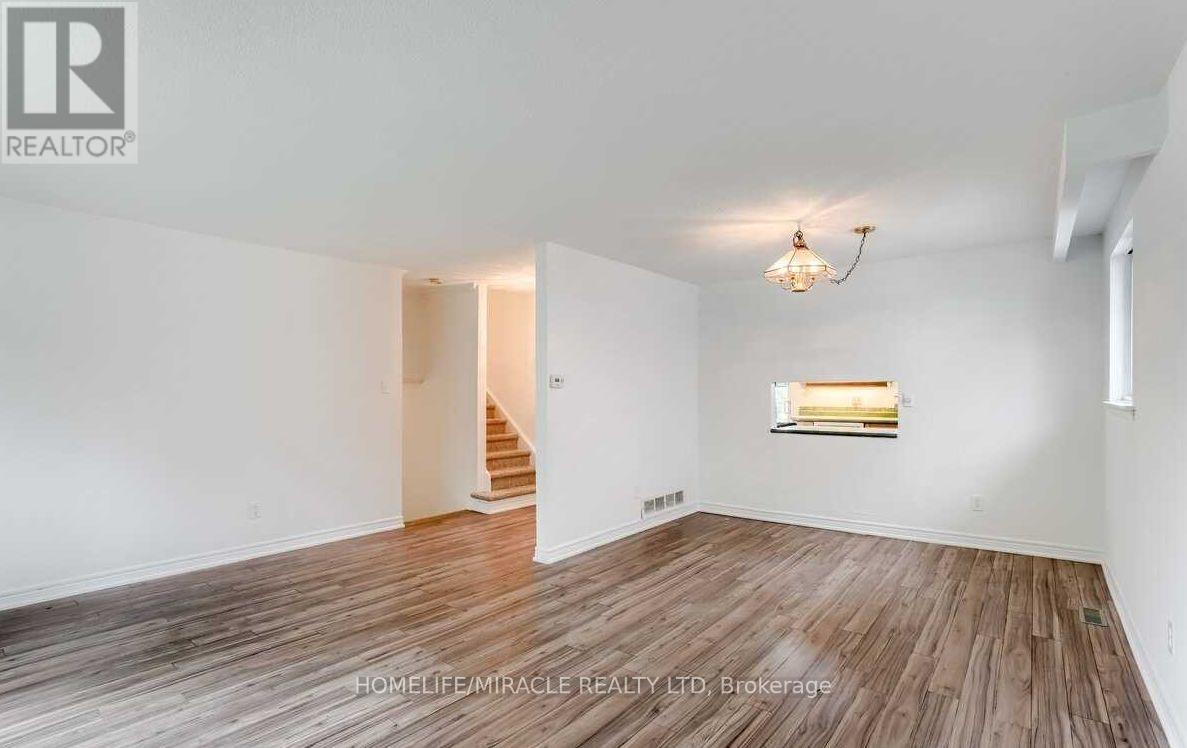 83 Grassington Crescent, Brampton, Ontario  L6S 1Z5 - Photo 4 - W12708048