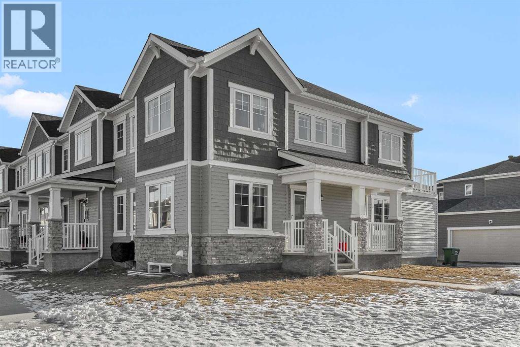 11 Carringham Way Nw, Calgary, Alberta  T3P 1W2 - Photo 2 - A2277979