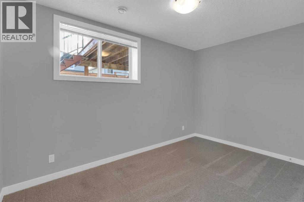 192 Heritage Boulevard W, Cochrane, Alberta  T4C 0S5 - Photo 27 - A2278929