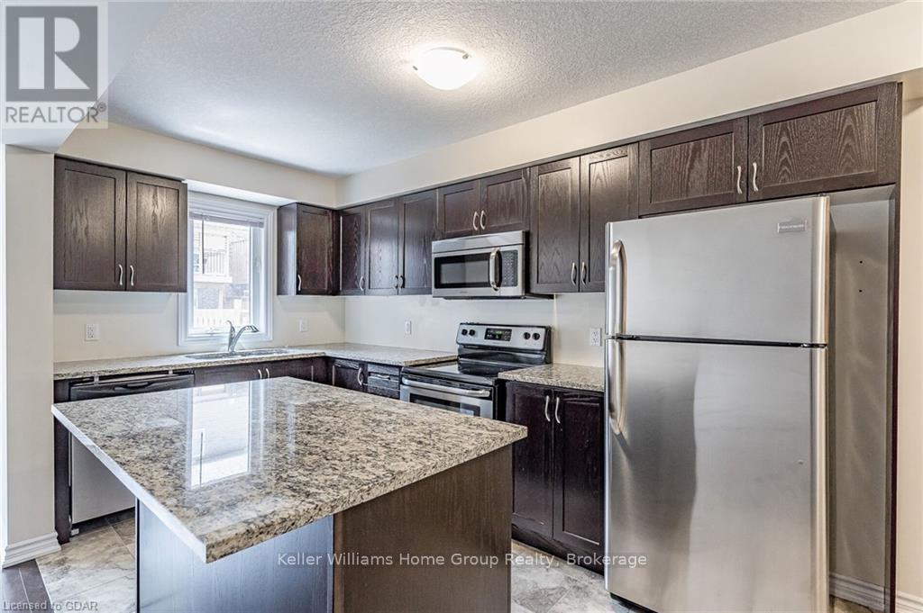 166 Summit Ridge Drive, Guelph (Grange Road), Ontario  N1E 0L7 - Photo 4 - X12709252