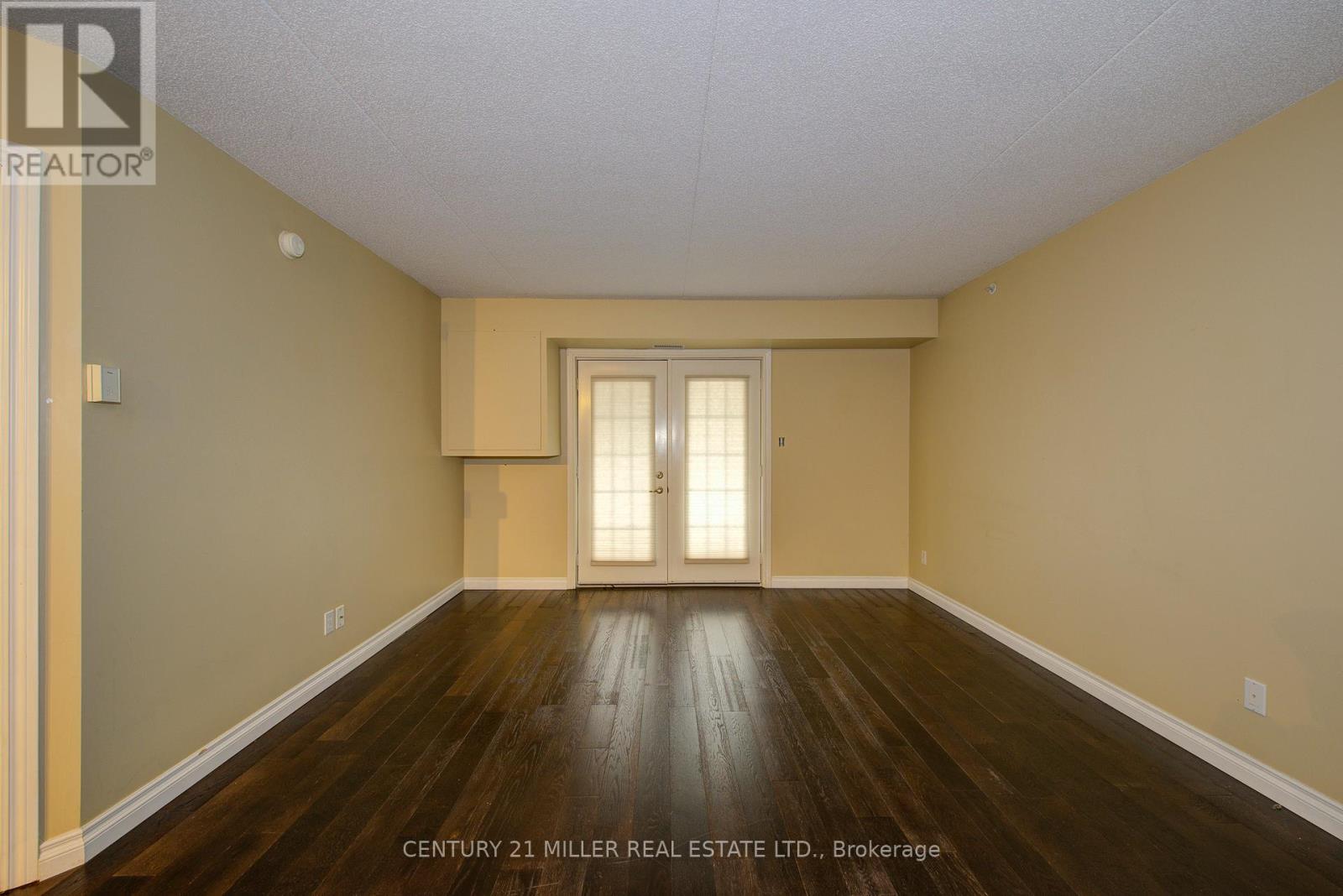 206 - 1451 Walkers Line, Burlington, Ontario  L7M 4P1 - Photo 2 - W12709364