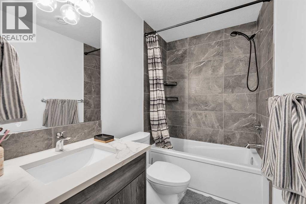 52 Edith Gate Nw, Calgary, Alberta  T3A 1Z2 - Photo 42 - A2265136