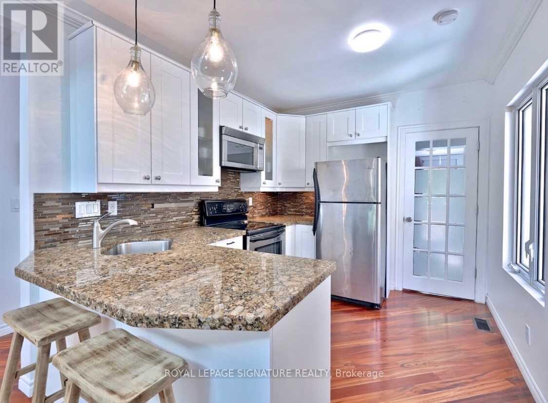 Main - 20 Amroth Avenue, Toronto, Ontario  M4C 4H2 - Photo 9 - E12709738