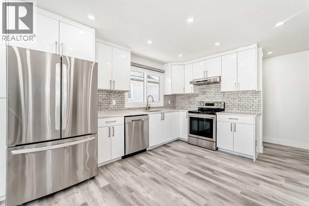 623 Madeira Drive Ne, Calgary, Alberta  T2A 4M7 - Photo 5 - A2275824