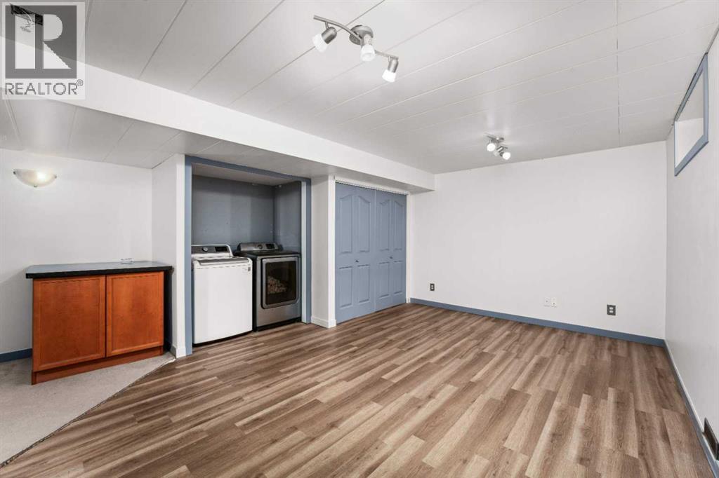 2034 Luxstone Boulevard Sw, Airdrie, Alberta  T4B 0A4 - Photo 30 - A2279633