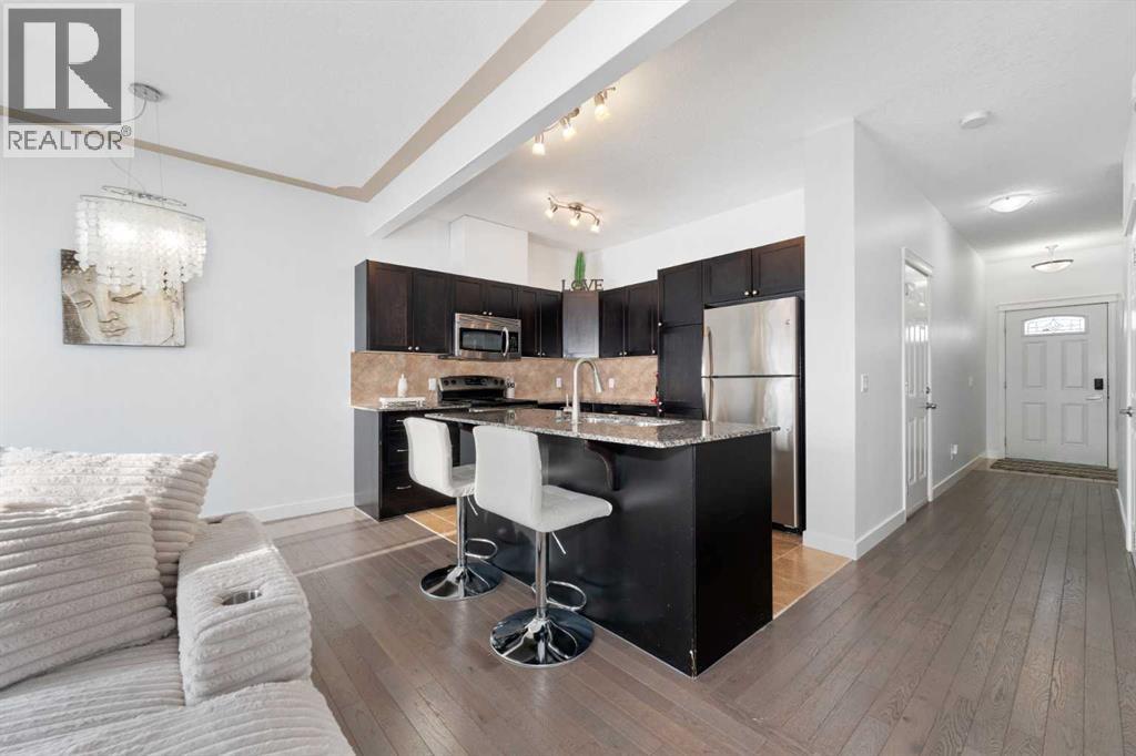 602, 620 Luxstone Landing Sw, Airdrie, Alberta  T4B 0B6 - Photo 4 - A2273916