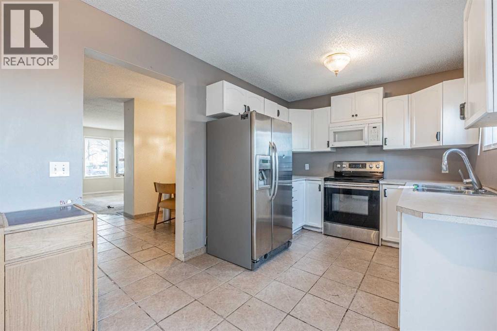 68 Abbeydale Villas Ne, Calgary, Alberta  T2A 7P6 - Photo 5 - A2280065