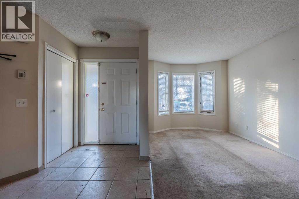 68 Abbeydale Villas Ne, Calgary, Alberta  T2A 7P6 - Photo 3 - A2280065