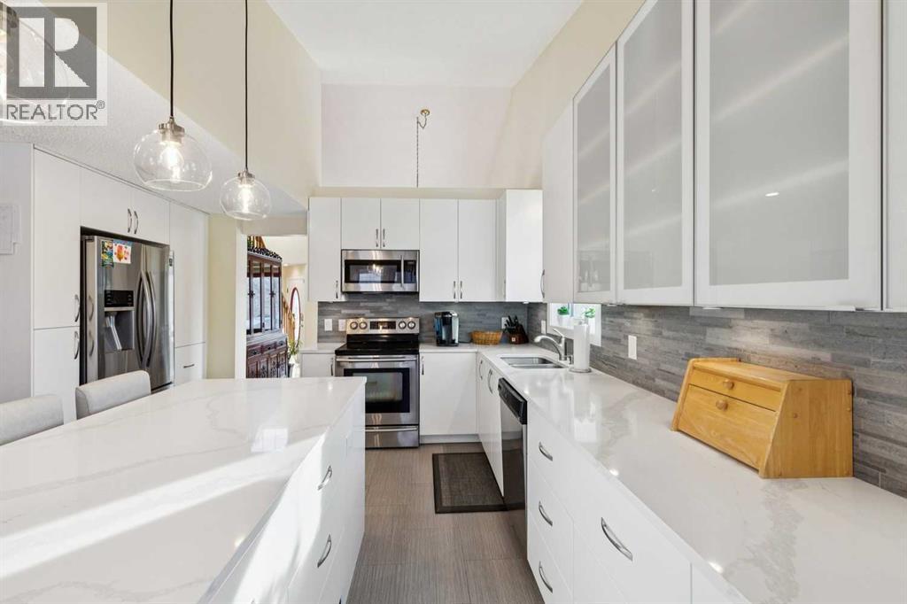 181 Woodford Drive Sw, Calgary, Alberta  T2W 4C2 - Photo 12 - A2277176