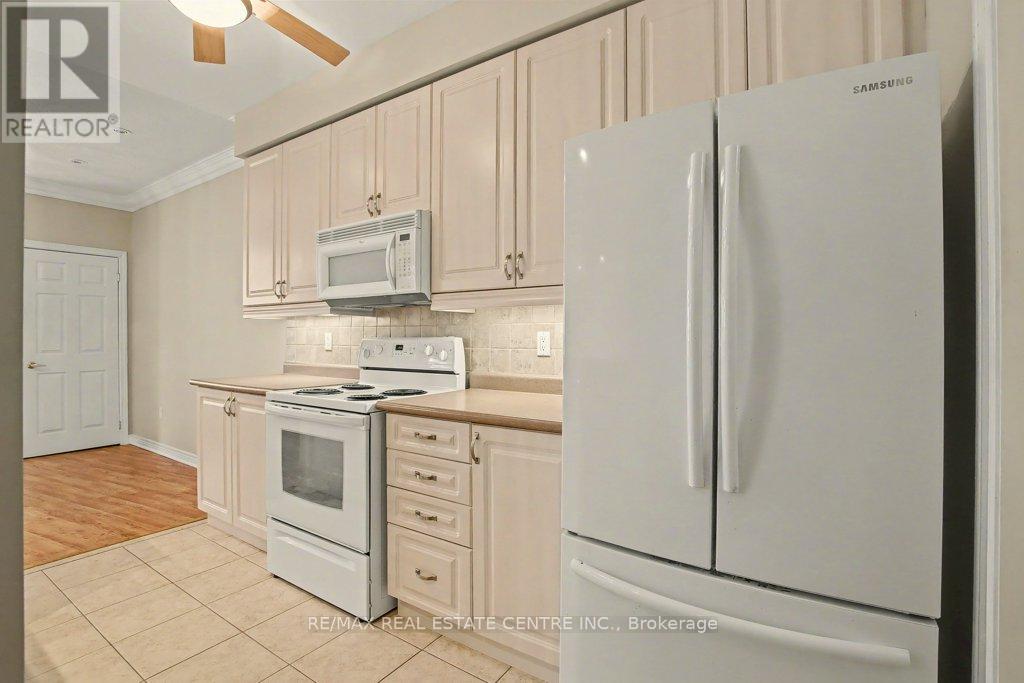 313 - 443 Centennial Forest Drive, Milton, Ontario  L9T 6A1 - Photo 19 - W12711102