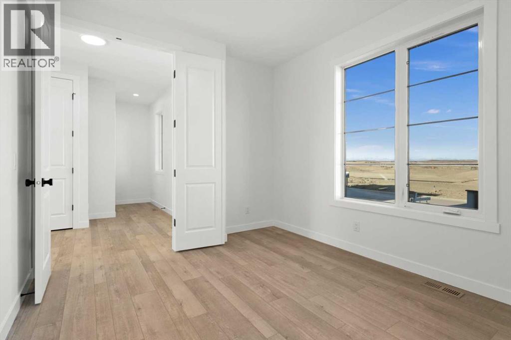 207 Perch Bend, Rural Rocky View County, Alberta  T3Z 0J9 - Photo 21 - A2263864