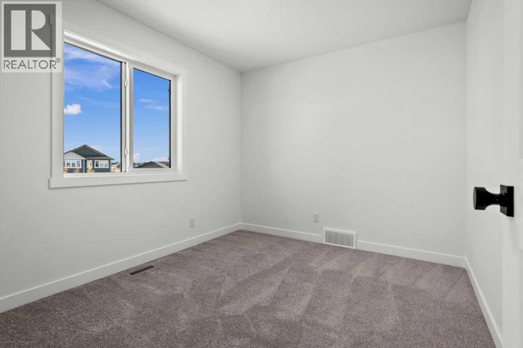 207 Perch Bend, Rural Rocky View County, Alberta  T3Z 0J9 - Photo 34 - A2263864