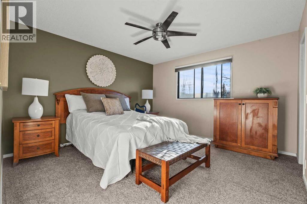 15 Beacham Rise Nw, Calgary, Alberta  T3K 1S1 - Photo 18 - A2279233