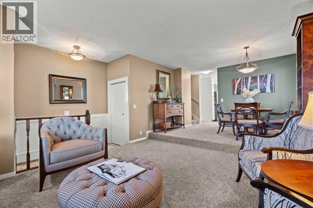 15 Beacham Rise Nw, Calgary, Alberta  T3K 1S1 - Photo 5 - A2279233