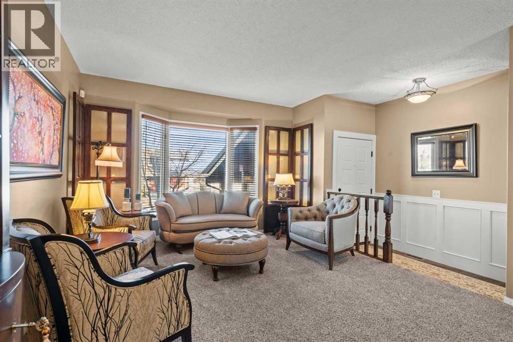 15 Beacham Rise Nw, Calgary, Alberta  T3K 1S1 - Photo 4 - A2279233