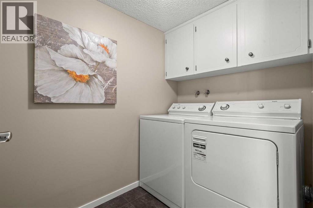 15 Beacham Rise Nw, Calgary, Alberta  T3K 1S1 - Photo 34 - A2279233