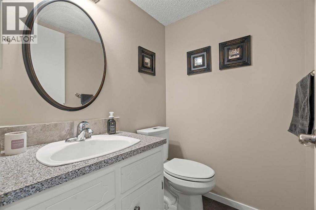 15 Beacham Rise Nw, Calgary, Alberta  T3K 1S1 - Photo 33 - A2279233