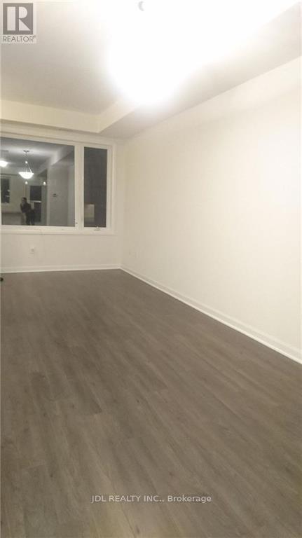 30 Sarah Jackson Crescent, Toronto, Ontario  M3K 0B6 - Photo 5 - W12711450