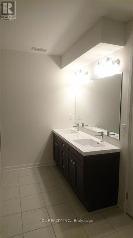 30 Sarah Jackson Crescent, Toronto, Ontario  M3K 0B6 - Photo 6 - W12711450