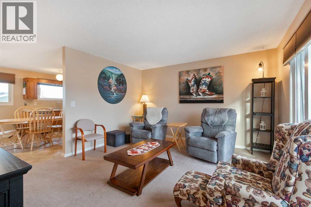 127 Edey Close, Cremona, Alberta  T0M 0R0 - Photo 5 - A2279003