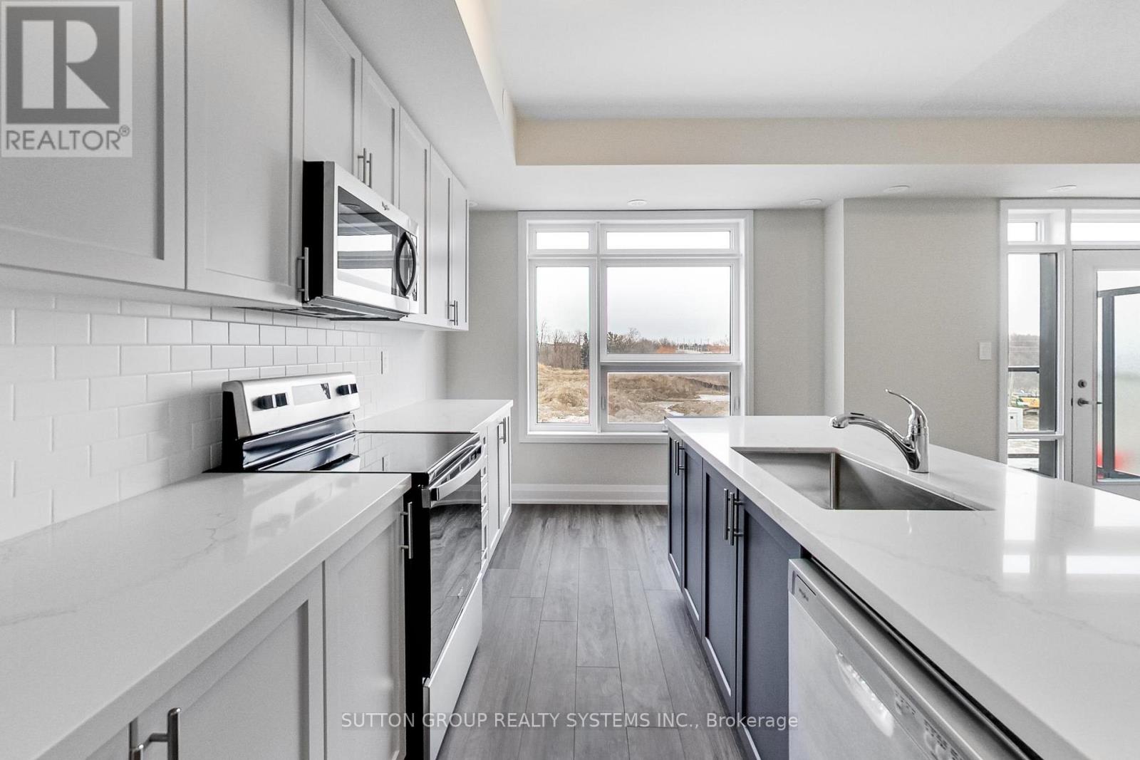 103 - 1577 Rose Way, Milton, Ontario  L9E 0J2 - Photo 9 - W12711552