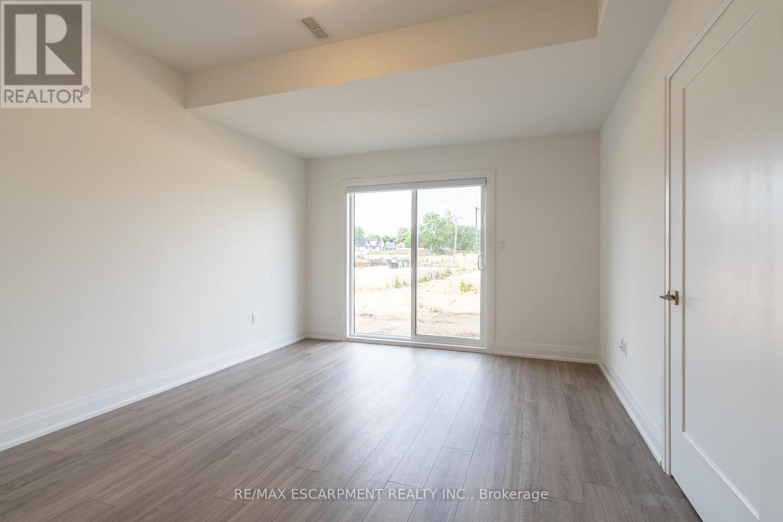 15 Raspberry Lane, Hamilton, Ontario  L0R 1W0 - Photo 2 - X12704504