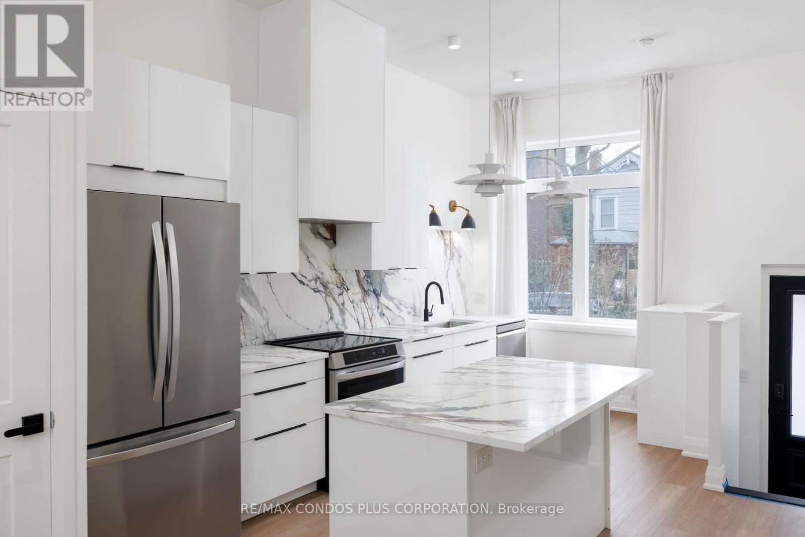 Main - 219 Sorauren Avenue, Toronto, Ontario  M6R 2G1 - Photo 3 - W12711590