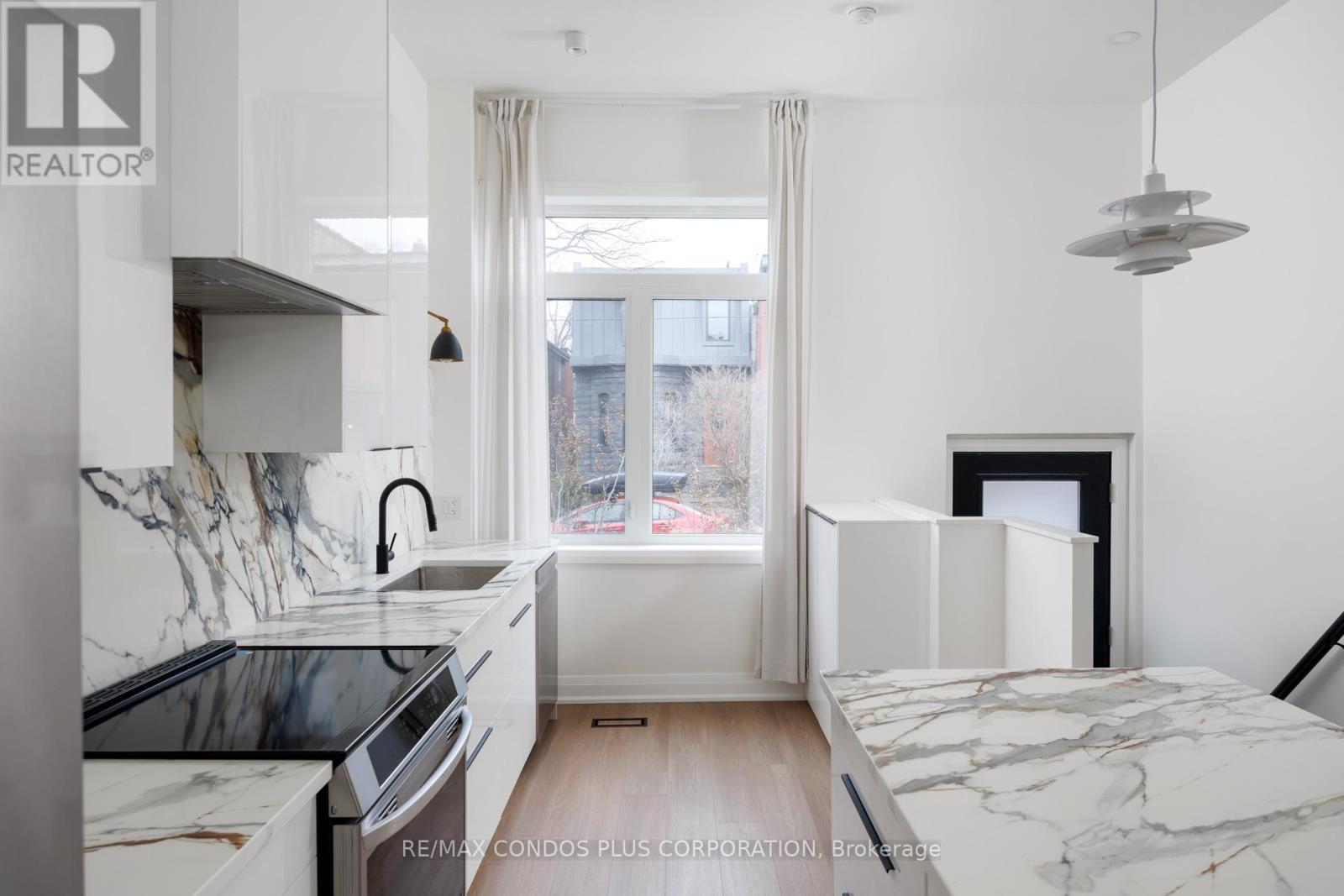 Main - 219 Sorauren Avenue, Toronto, Ontario  M6R 2G1 - Photo 4 - W12711590