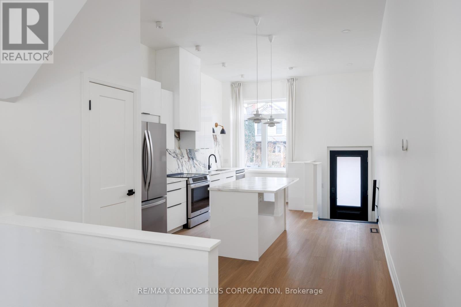 Main - 219 Sorauren Avenue, Toronto, Ontario  M6R 2G1 - Photo 5 - W12711590