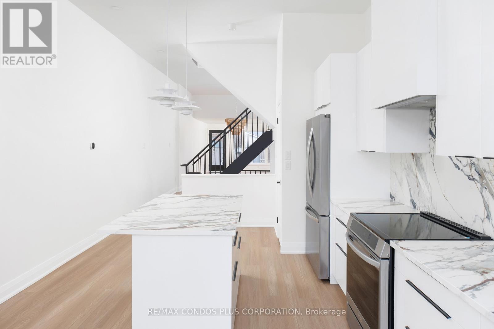 Main - 219 Sorauren Avenue, Toronto, Ontario  M6R 2G1 - Photo 6 - W12711590