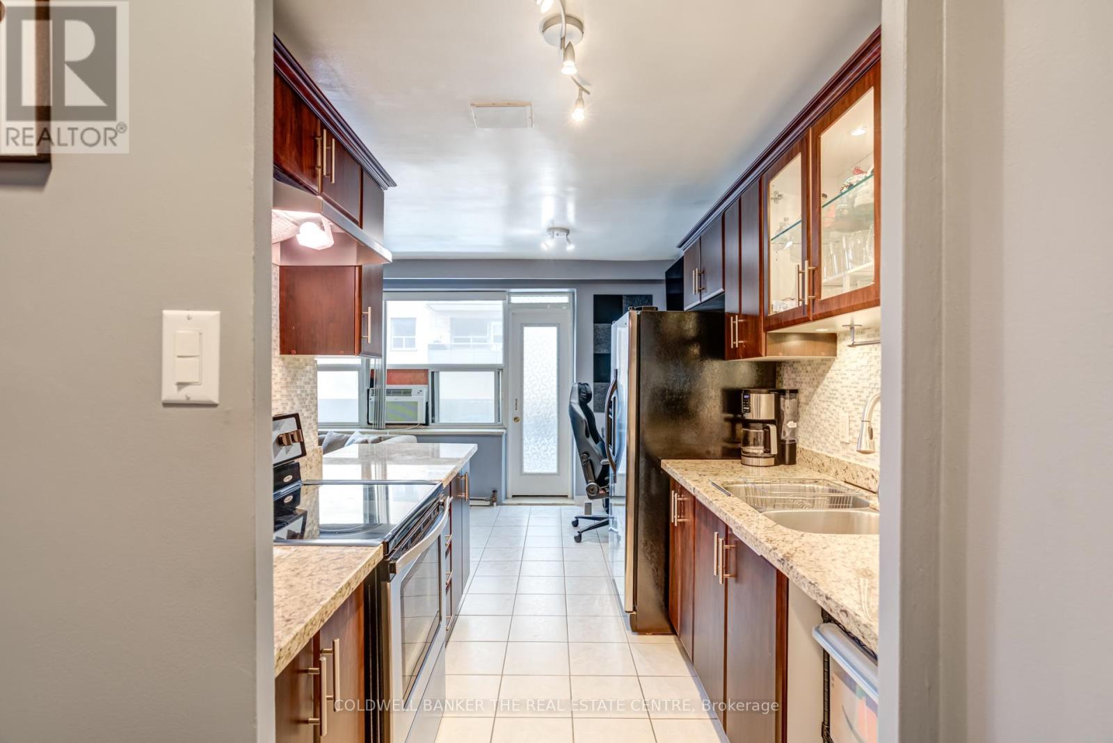 208 - 50 Gulliver Road, Toronto, Ontario  M6M 2N2 - Photo 10 - W12711636