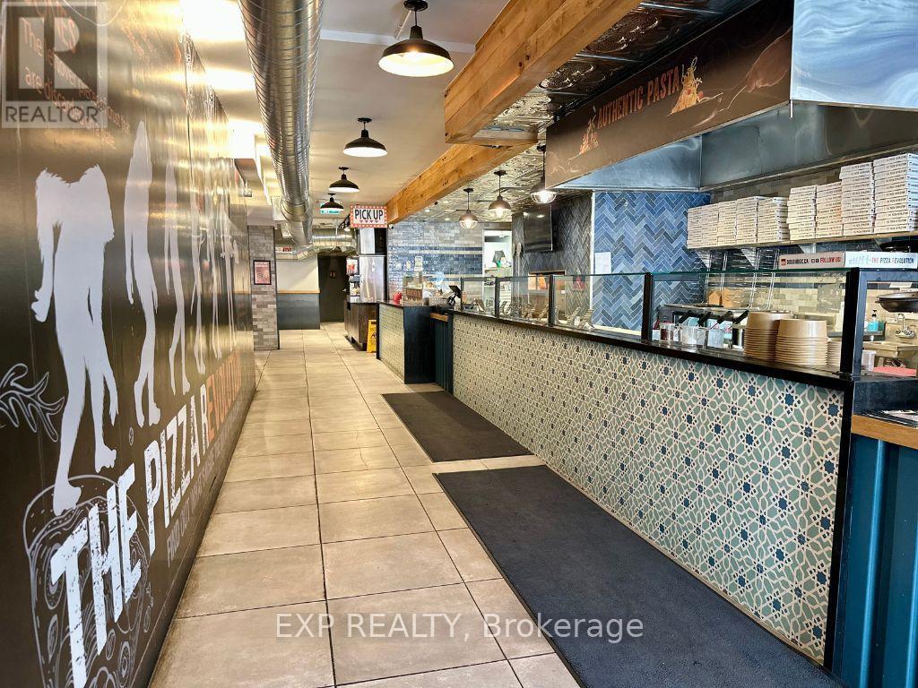 162 Lakeshore Road E, Oakville, Ontario  L6J 1H6 - Photo 3 - W12711840