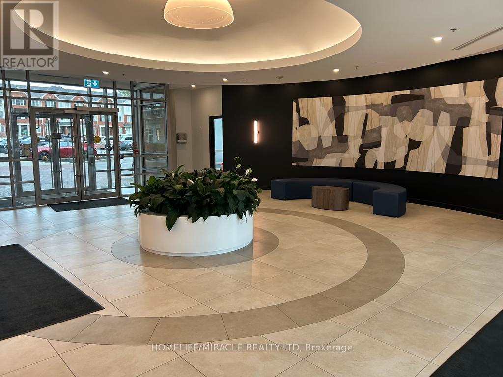 709 - 215 Queen Street E, Brampton, Ontario  L6W 0A9 - Photo 4 - W12522952