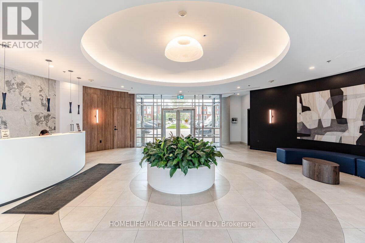 709 - 215 Queen Street E, Brampton, Ontario  L6W 0A9 - Photo 3 - W12522952