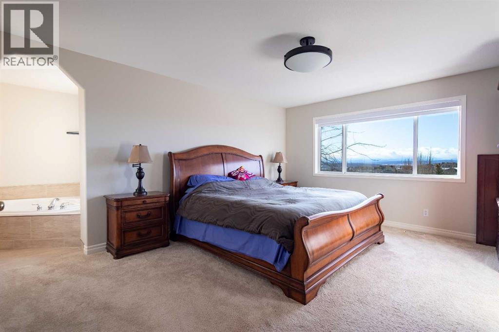 109 Simcrest Heights Sw, Calgary, Alberta  T3H 4K1 - Photo 35 - A2278428