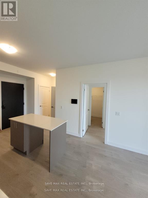 1113 - 3220 William Coltson Avenue N, Oakville, Ontario  L6H 7C2 - Photo 3 - W12711890