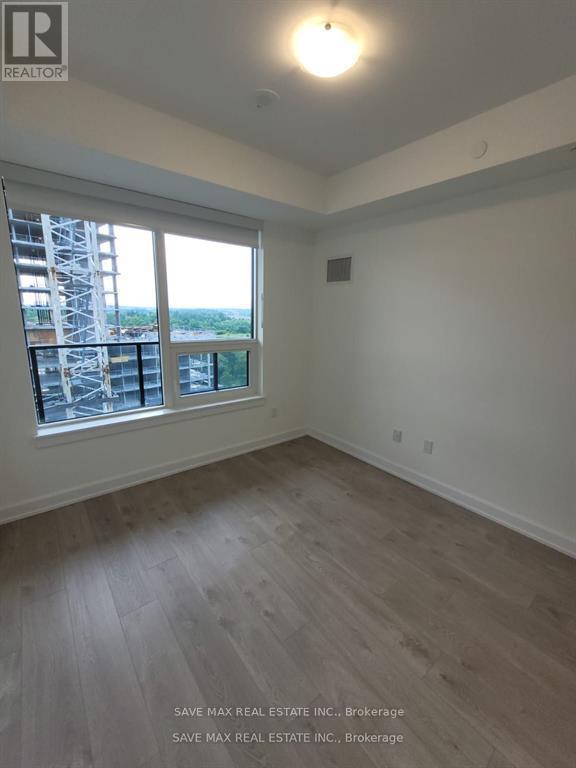 1113 - 3220 William Coltson Avenue N, Oakville, Ontario  L6H 7C2 - Photo 4 - W12711890